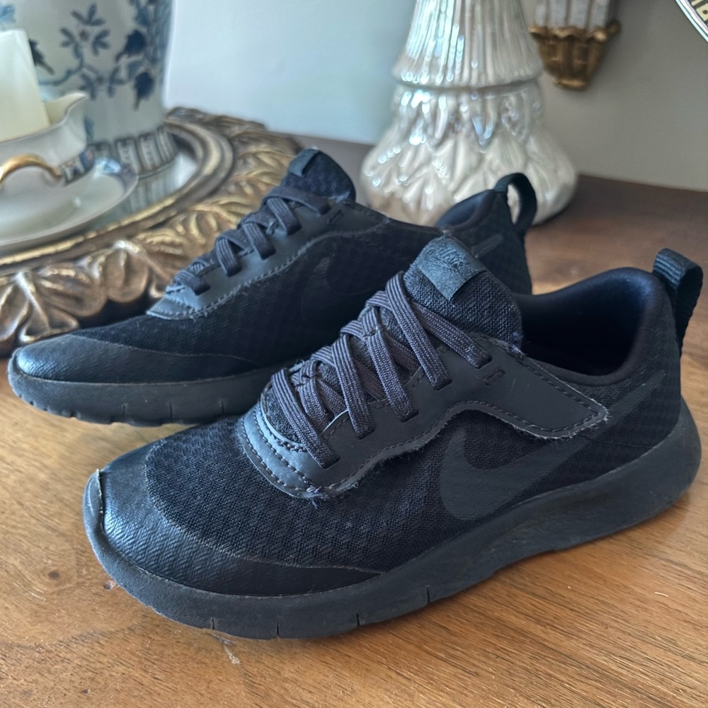 Nike size 13.5 kids shoe. Top is Velcro